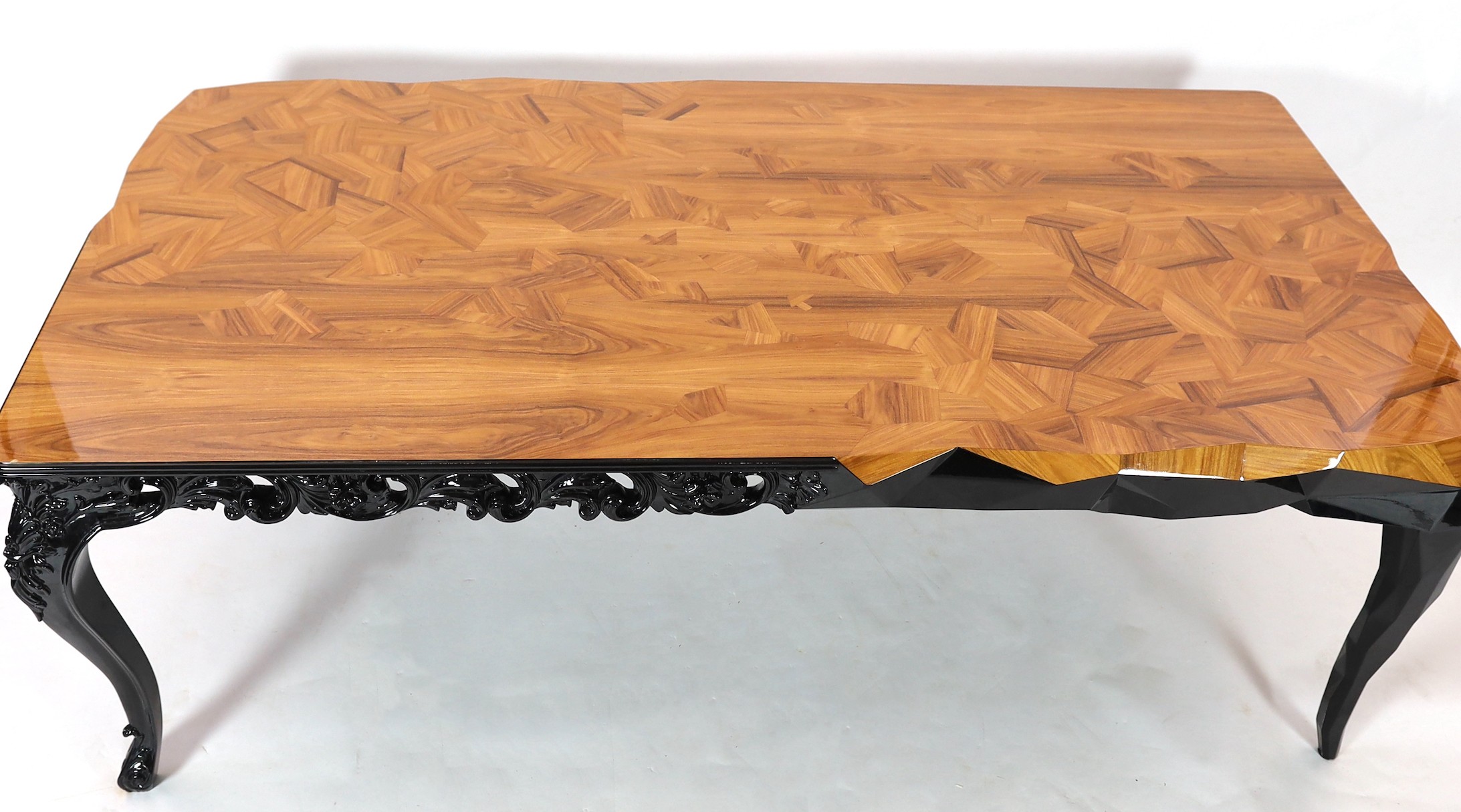 A contemporary Boca Do Lobo palissandre and black lacquer 'Royal' dining table
